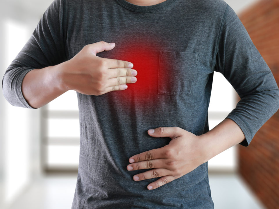 MAN with symptomatic acid reflux , suffering from acid reflux